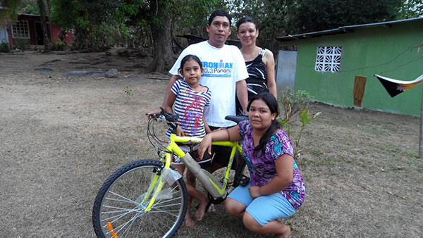 Oliver with new bicycle to get to work